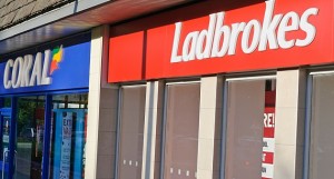 Ladbrokes Coral merger high street betting shops