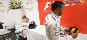 Rosberg throwing cap at Hamilton